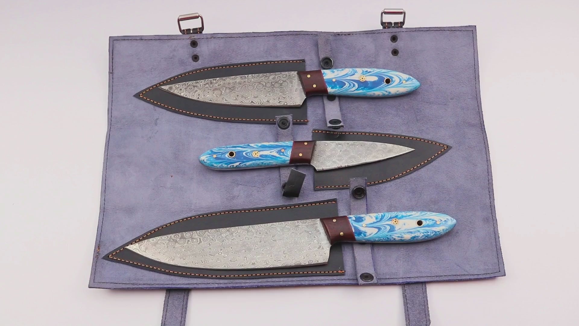 Damascus Steel Chef Knife Set with Wavy Blue Handle & Genuine Leather Roll – Handcrafted for Precision and Style